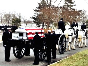 The caisson carries Steve Topscher’s remains to the Arlington National Cemetery Columbarium